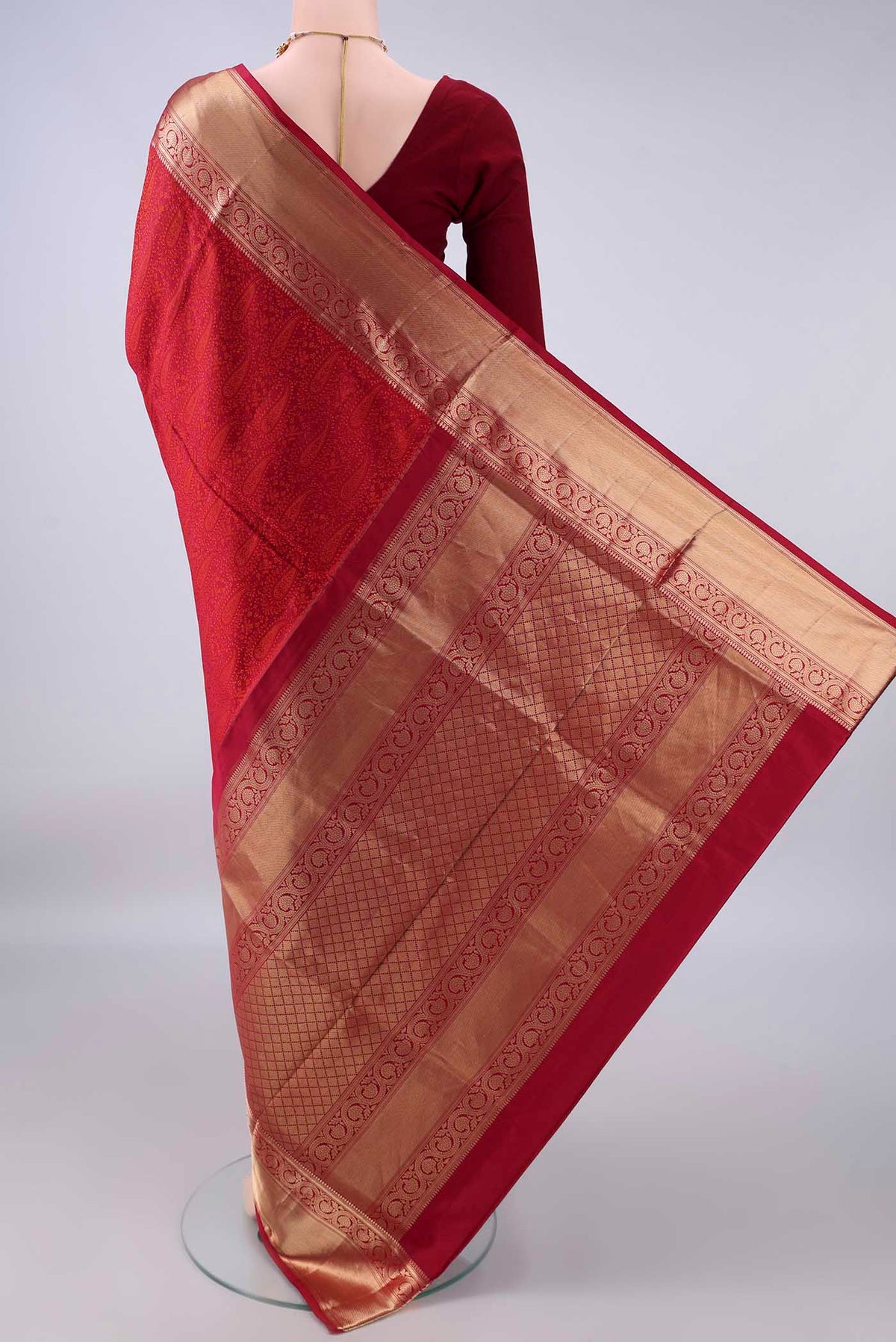 Flat view of Pure Silk Deep Red Soft Saree with Jacquard design on the body and Zari Border. 