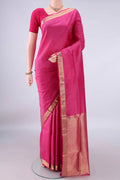 Pure Silk Pink Soft Saree with Plain Body and Zari Border.  displayed on a mannequin