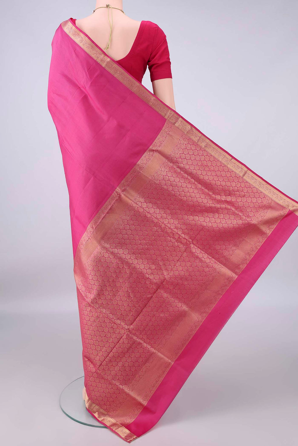 Flat view of Pure Silk Pink Soft Saree with Plain Body and Zari Border. 
