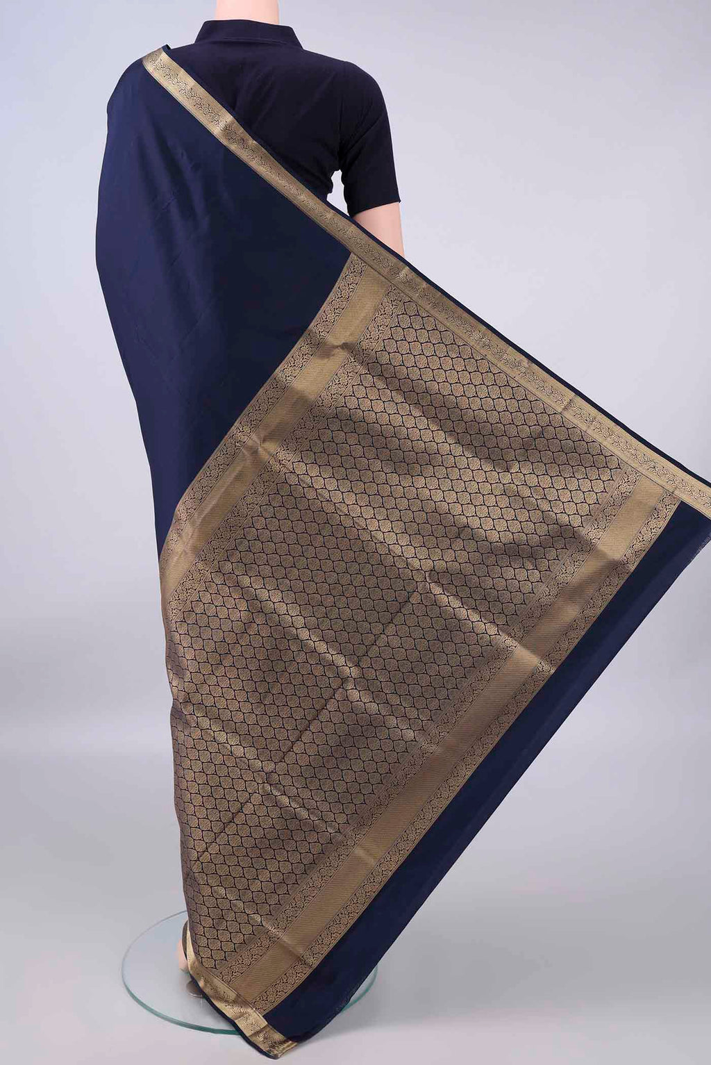 Flat view of Pure Silk Navy Blue Soft Saree with Plain Body and Zari Border. 