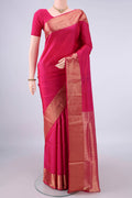 Pure Silk Rani Pink Soft Saree with Plain Body and Zari Border.  displayed on a mannequin
