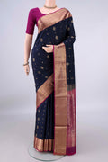 Pure Silk Navy Blue Soft Saree with Zari Butta on the body and Zari Border.  displayed on a mannequin