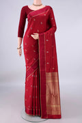 Pure Silk Maroon Soft Saree with Zari Butta on the body and Zari Border.  displayed on a mannequin