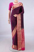 Pure Silk Purple Soft Saree with Zari Butta on the body and Zari Border.  displayed on a mannequin