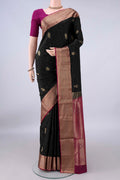 Pure Silk Black Soft Saree with Jacquard design on the body and Zari Border.  displayed on a mannequin