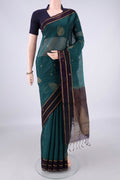 Peacock Blue Silk Cotton Saree with Zari Butta on the body and Zari Border.  displayed on a mannequin