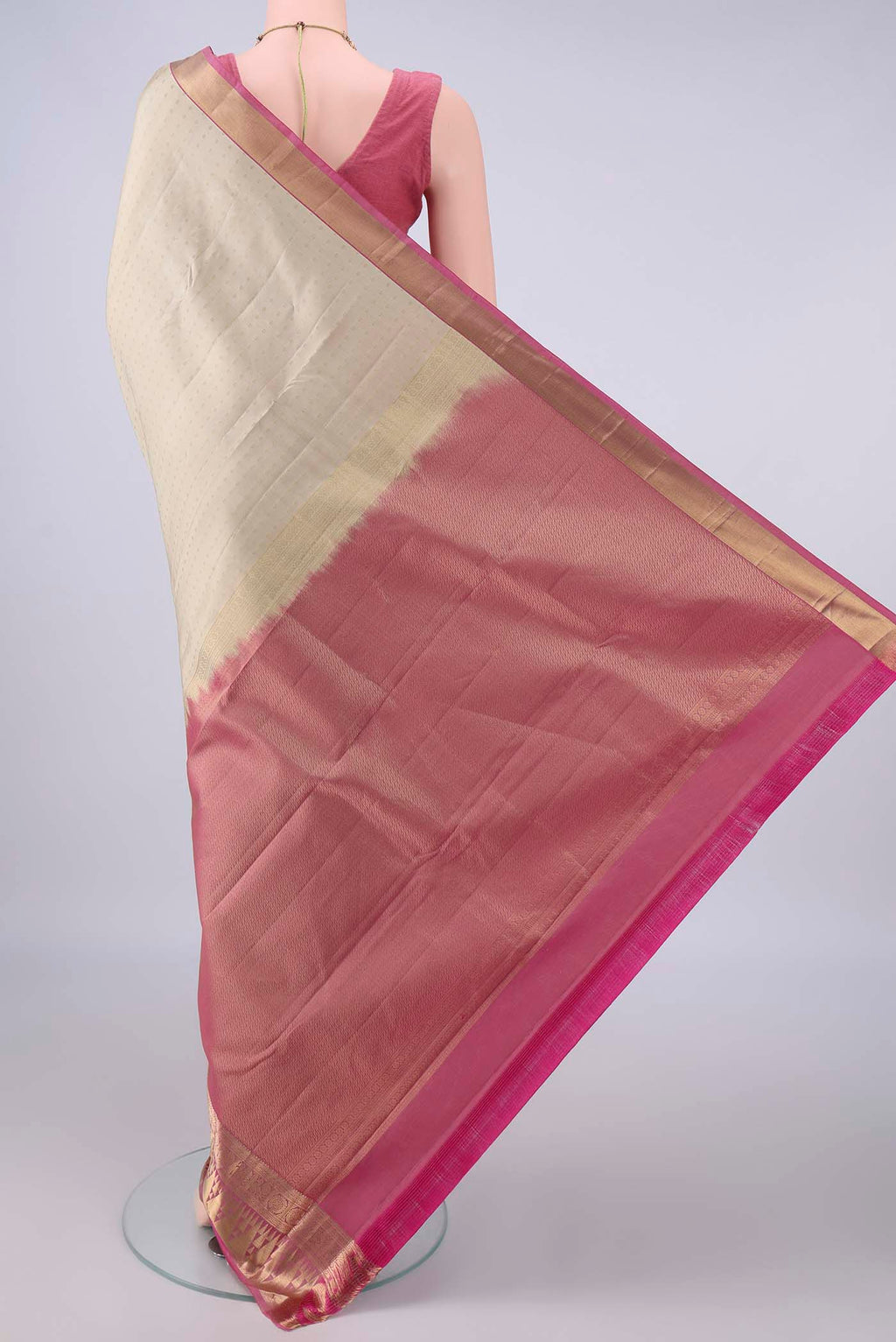 Flat view of Pure Silk Beige Kanchipuram Saree with Zari Butta on the body and Zari Border. 