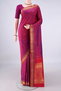 Pure Silk Magenta Kanchipuram Saree with Zari Butta on the body and Zari Border.  displayed on a mannequin