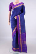 Pure Silk Blue Kanchipuram Saree with Stripes on the body and Zari Border.  displayed on a mannequin
