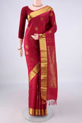 Pure Silk Maroon Kanjivaram Saree with Zari Butta on the body and Zari Border.  displayed on a mannequin
