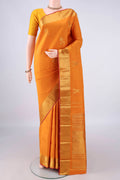 Pure Silk Mustard Kanjivaram Saree with Zari Butta on the body and Zari Border.  displayed on a mannequin