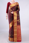 Pure Silk Maroon Dual Tone Kanjivaram Saree with Zari Butta on the body and Zari Border.  displayed on a mannequin