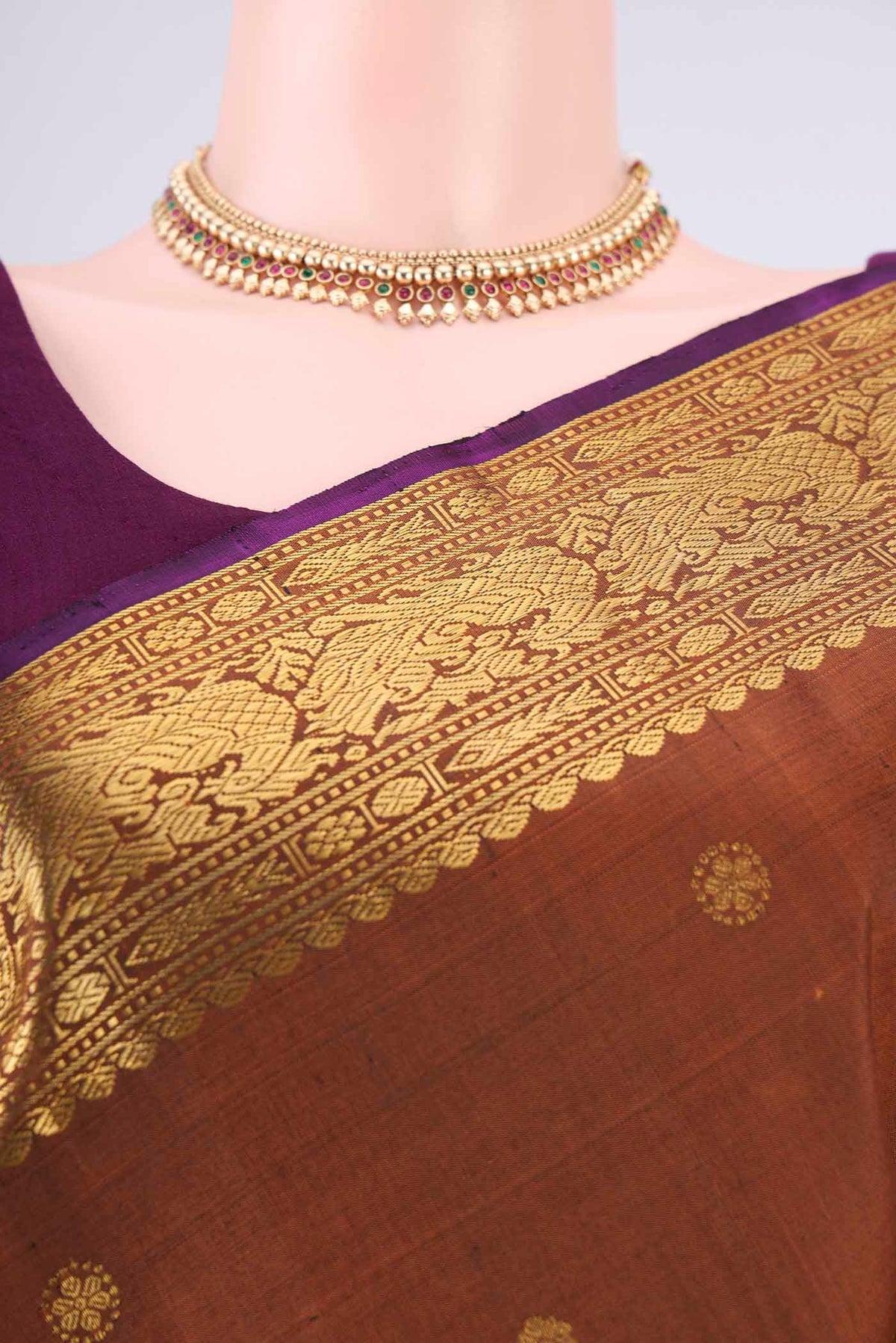 Border image of Pure Silk Bronze Kanjivaram Saree with Zari Butta on the body and Zari Border. 