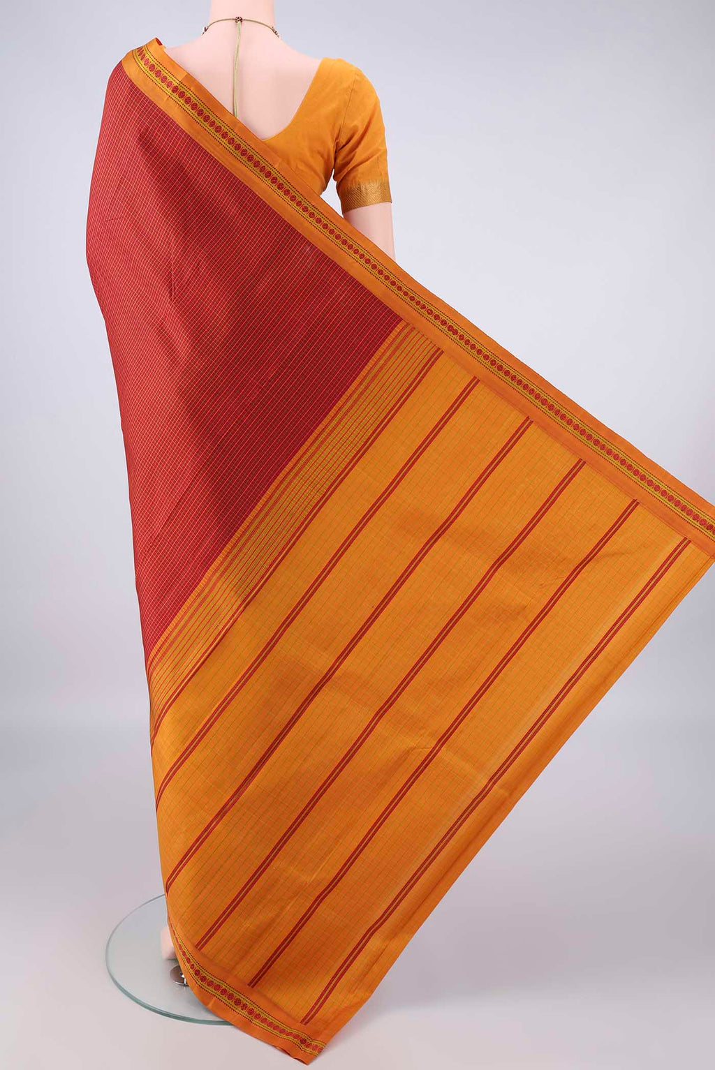 Flat view of Pure Silk Red Dual Tone Kanjivaram Saree with Checked design on the body and Thread Border. 