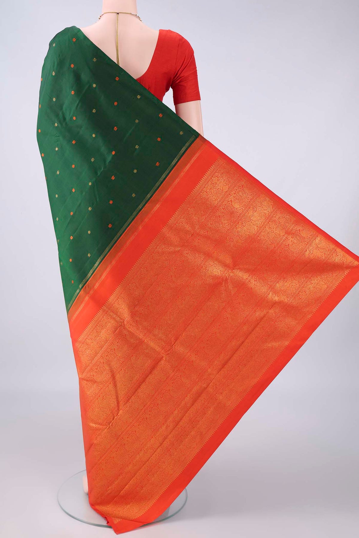 Flat view of Pure Silk Green Kanjivaram Saree with Thread Butta on the body and Without Border. 