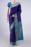 Pure Silk Dark Blue Soft Saree with Zari Butta on the body and Zari Border.  displayed on a mannequin