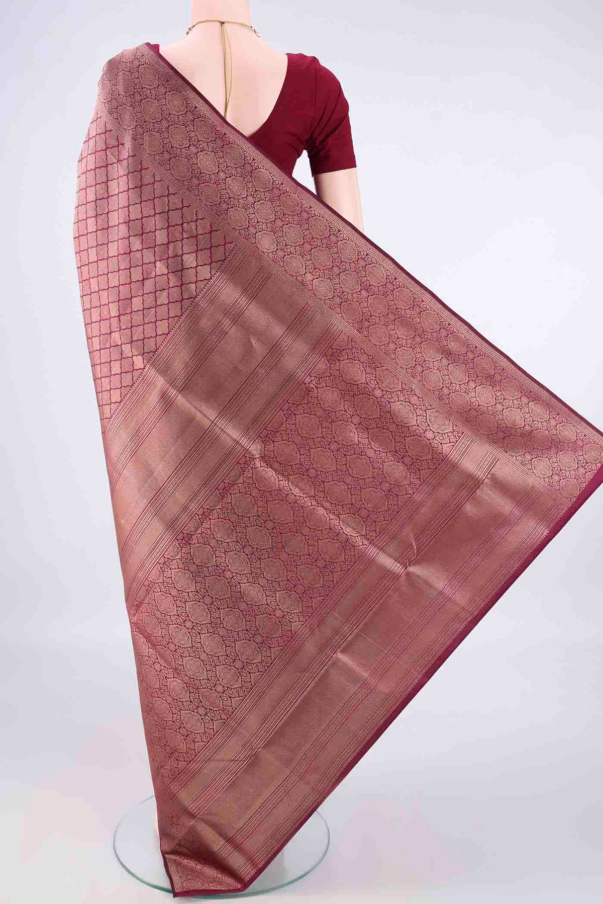 Flat view of Pure Silk Burgundy Soft Saree with Zari Brocade on the body and Zari Border. 