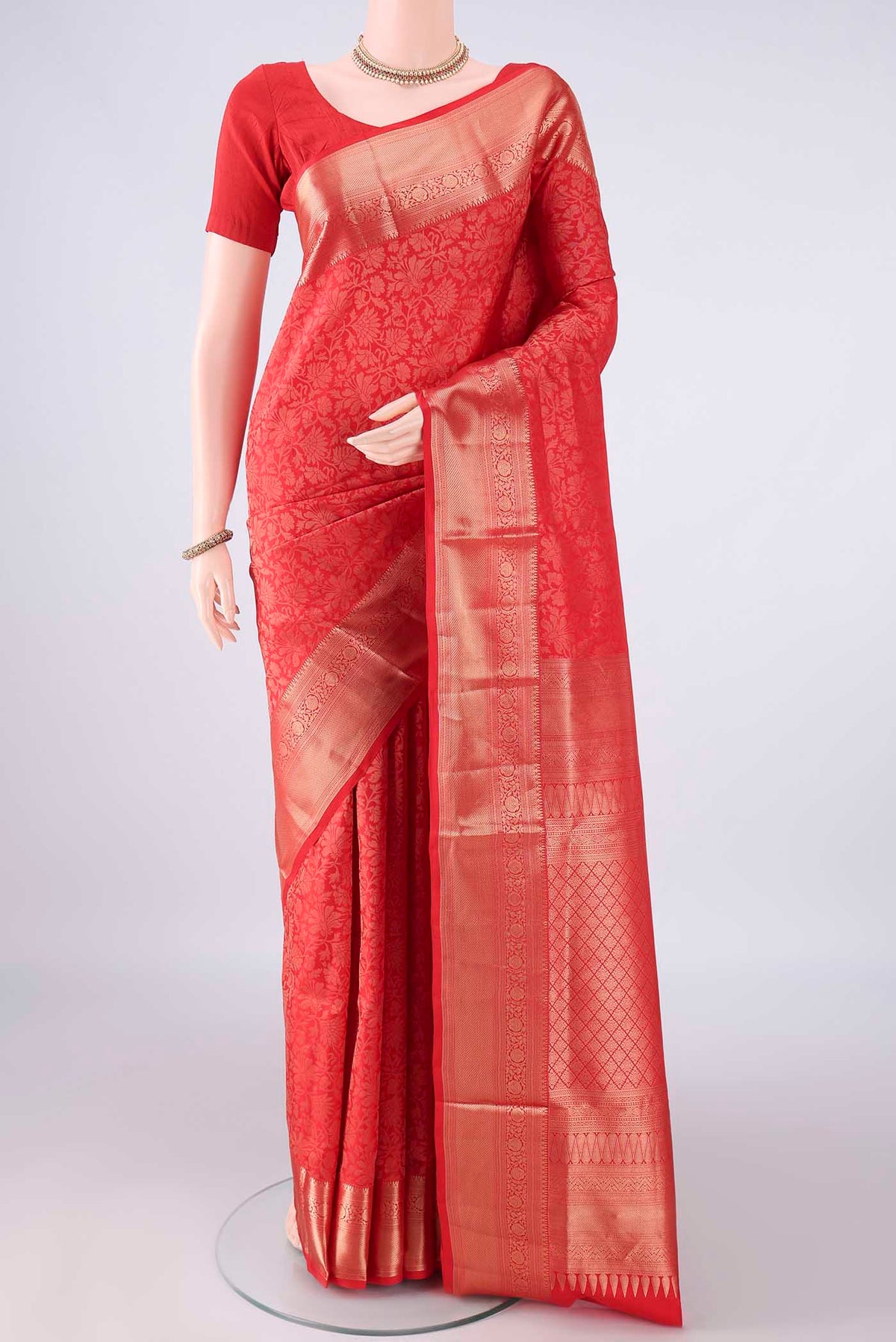 Pure Silk Red Soft Saree with Zari Brocade on the body and Zari Border.  displayed on a mannequin