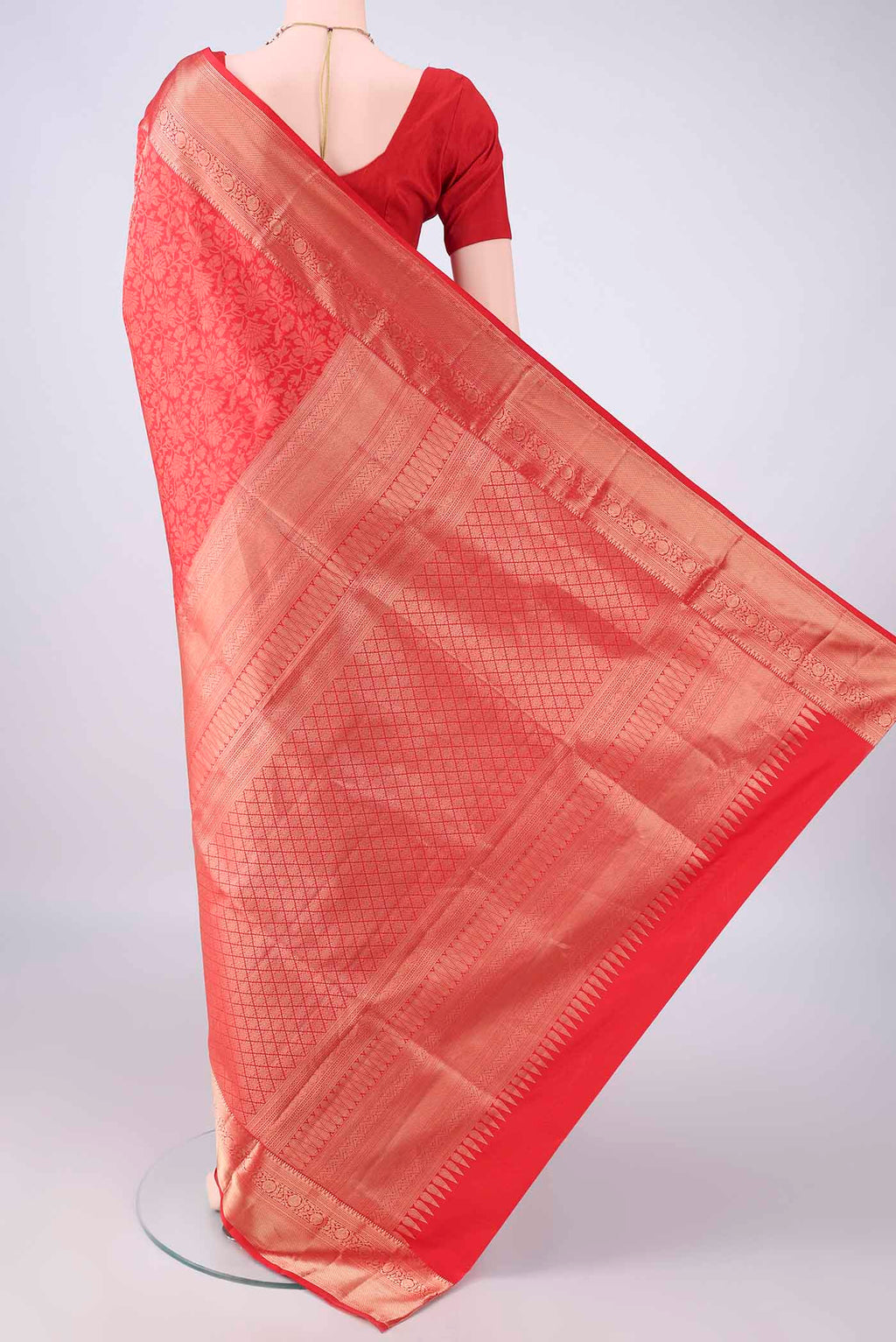 Flat view of Pure Silk Red Soft Saree with Zari Brocade on the body and Zari Border. 