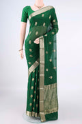 Green Mysore Georgette Saree with Zari Butta on the body and Zari Border.  displayed on a mannequin