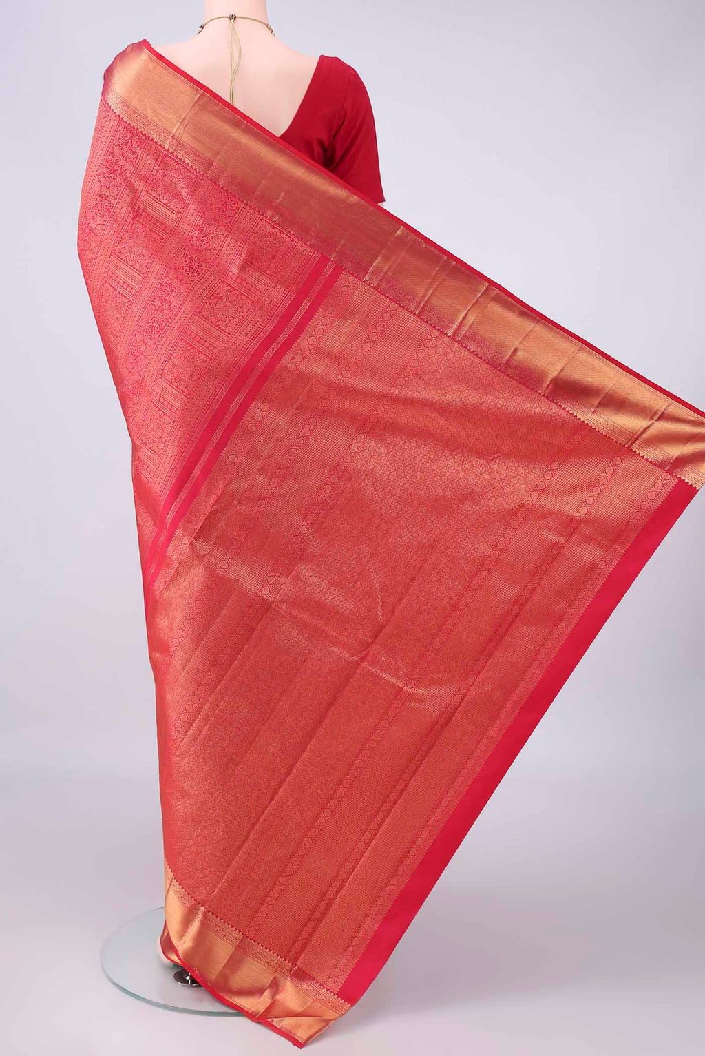 Flat view of Pure Silk Dark Pink Kanchipuram Saree with Zari Brocade on the body and Zari Border. 