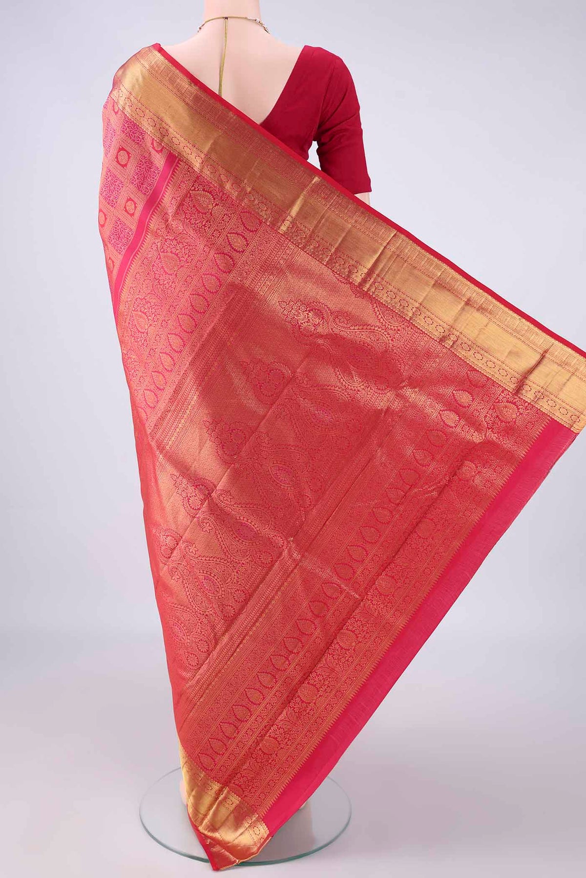 Flat view of Pure Silk Dark Pink Dual Tone Kanchipuram Saree with Zari Brocade on the body and Zari Border. 