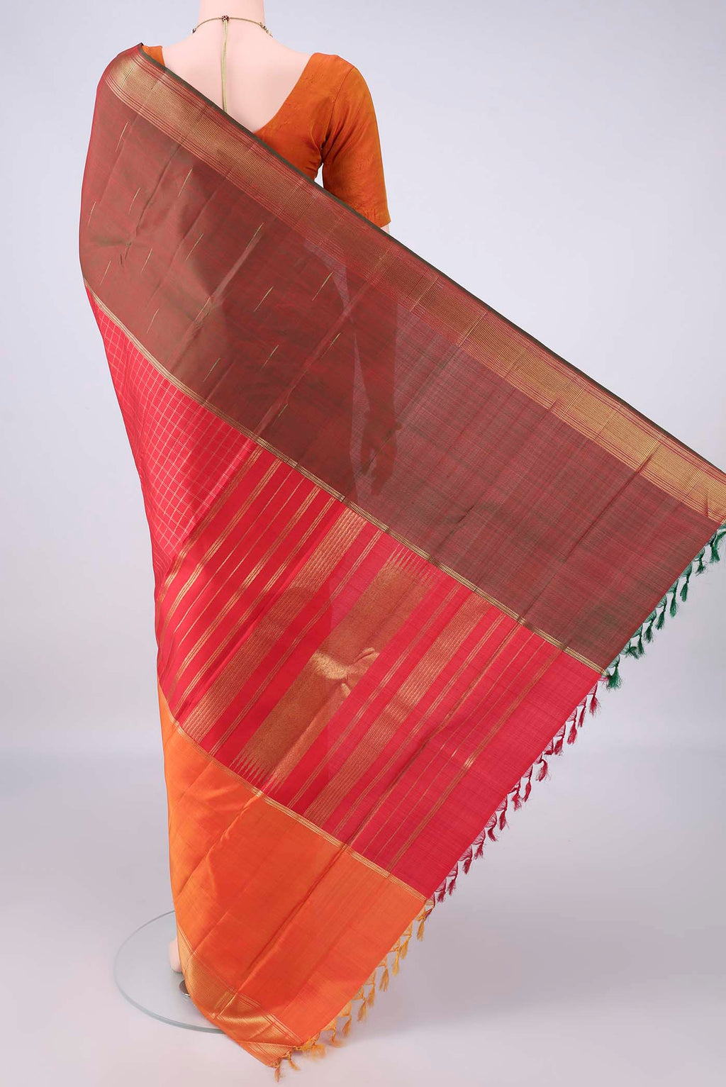 Flat view of Pure Silk Pure Zari Red Kanjivaram Saree with Checked design on the body and Ganga Jamuna Border. 