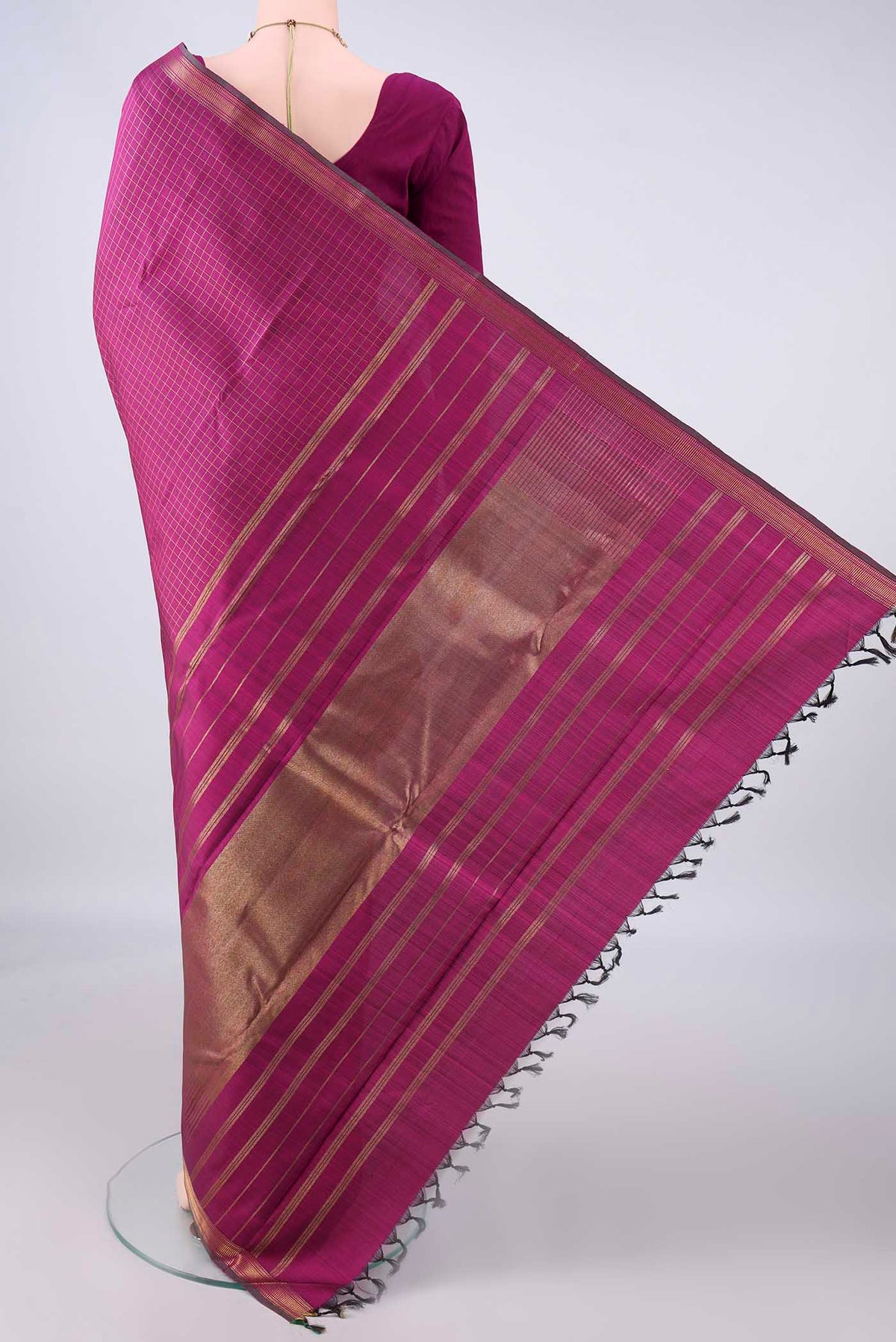 Flat view of Pure Silk Pure Zari Magenta Kanchipuram Saree with Checked design on the body and Zari Border. 