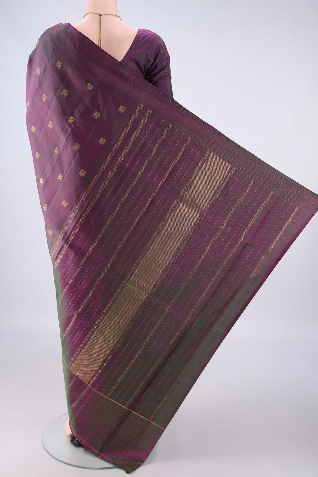 Flat view of Pure Silk Pure Zari Purple Dual Tone Kanchipuram Saree with Zari Butta on the body and Thin Zari Line. 