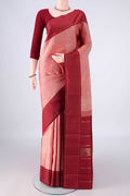 Pure Silk Pure Zari Peach Kanchipuram Saree with Zari Butta on the body and Plain Border.  displayed on a mannequin