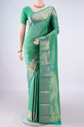 Pure Silk Sea Green Kanjivaram Saree with Zari Brocade on the body and Zari Border.  displayed on a mannequin