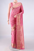 Pure Silk Rose pink Kanjivaram Saree with Zari Brocade on the body and Zari Border.  displayed on a mannequin