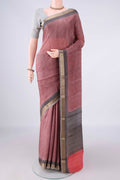 Peach Mysore Crepe Saree with Printed design on the body and Zari Border.  displayed on a mannequin
