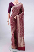 Pure Silk Burgundy Banarasi Saree with Zari Brocade on the body and Zari Border.  displayed on a mannequin