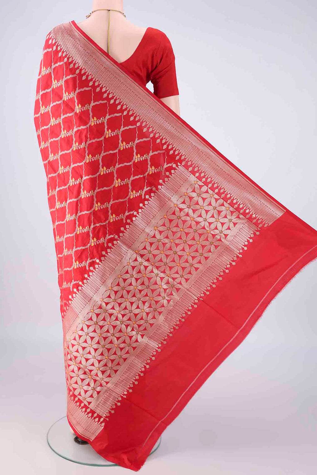 Flat view of Pure Silk Red Banarasi Saree with Zari And Thread Butta on the body and Zari Border. 