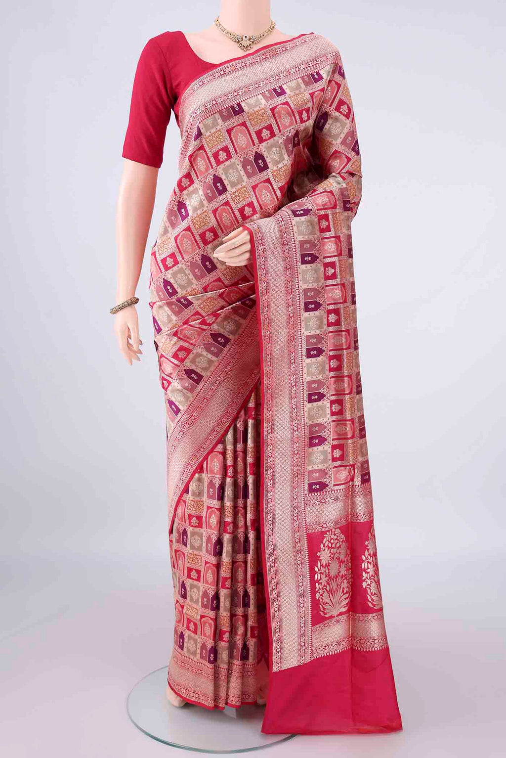 Pure Silk Multi Color Banarasi Saree with Zari Brocade on the body and Zari Border.  displayed on a mannequin