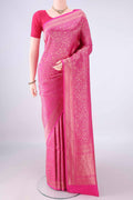 Pure Silk Pink Banarasi Saree with Zari Brocade on the body and Zari Border.  displayed on a mannequin
