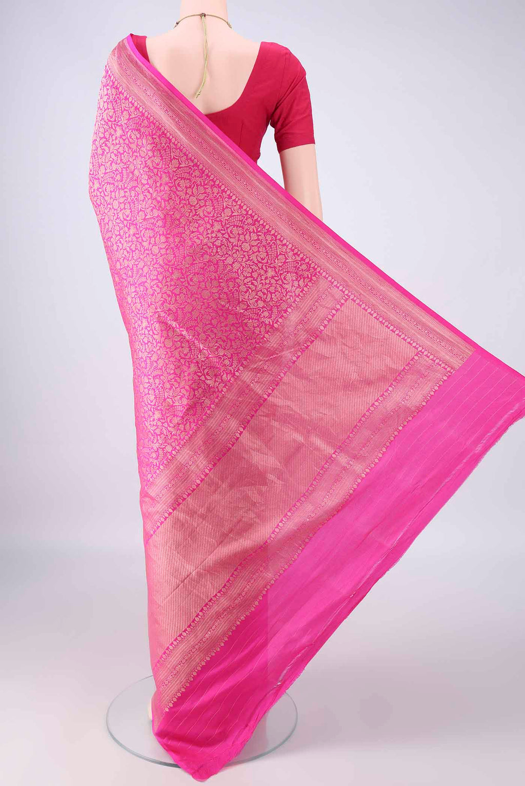 Flat view of Pure Silk Pink Banarasi Saree with Zari Brocade on the body and Zari Border. 