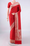 Red Banarasi Jamavar Saree with Zari Butta on the body and Zari Border.  displayed on a mannequin