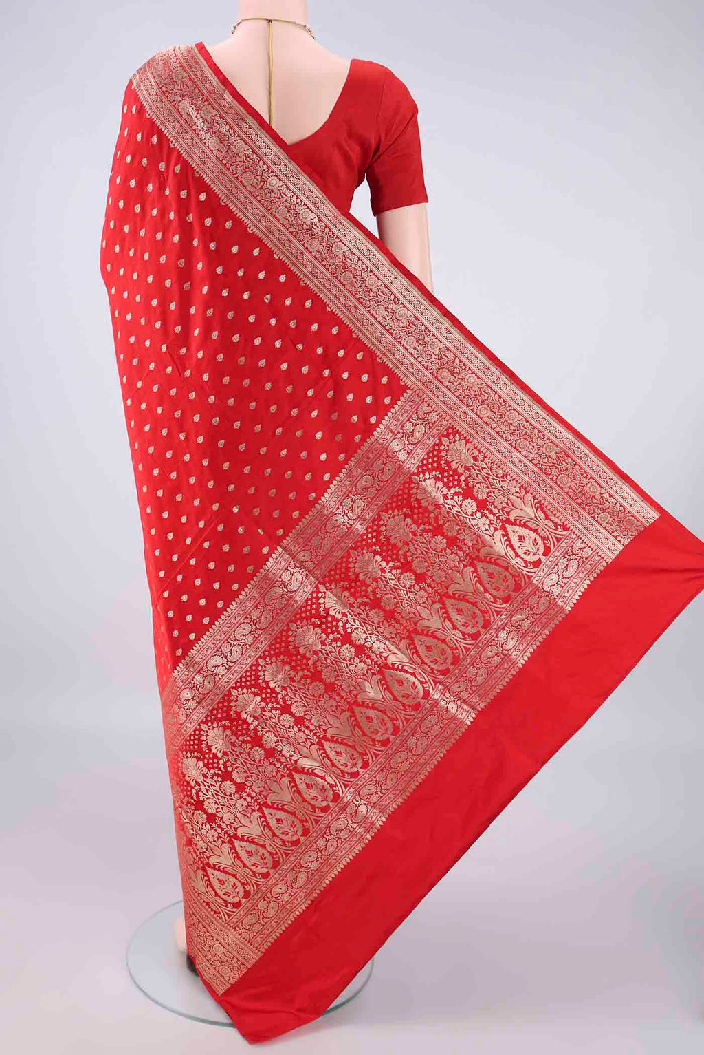 Flat view of Red Banarasi Jamavar Saree with Zari Butta on the body and Zari Border. 