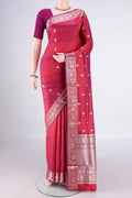 Pure Silk Magenta Dual Tone Banarasi Katan Saree with Zari Butta on the body and Zari Border.  displayed on a mannequin