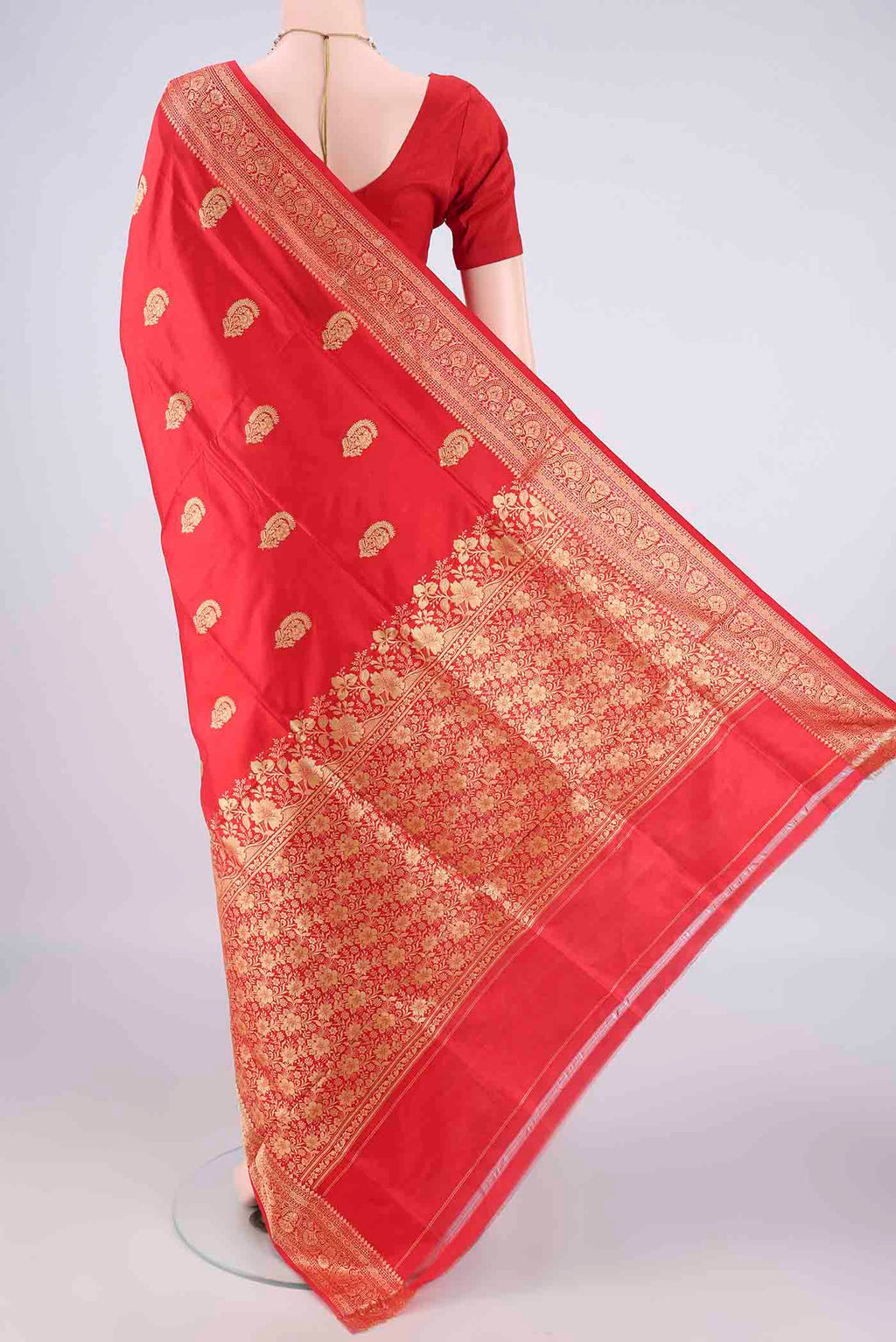 Flat view of Pure Silk Red Banarasi Katan Saree with Zari Butta on the body and Zari Border. 