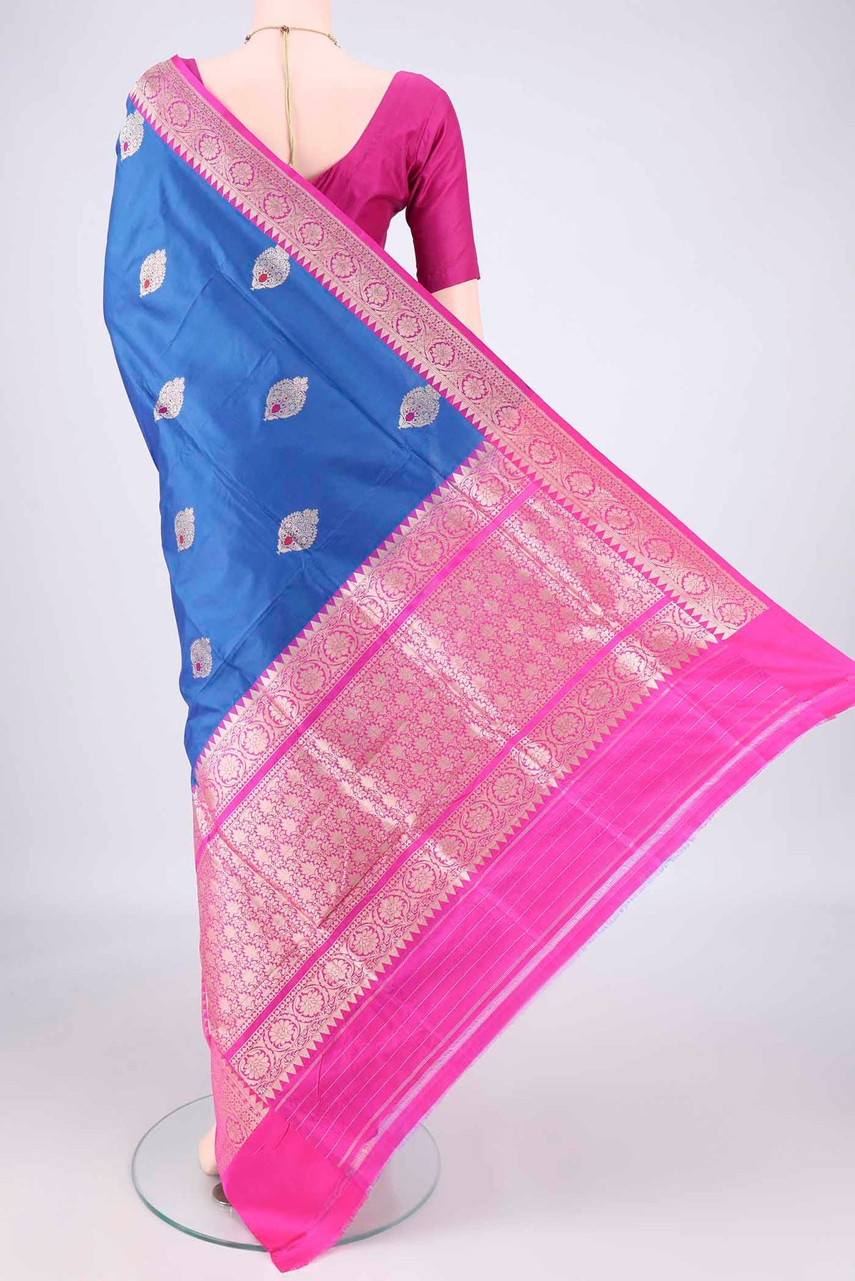 Flat view of Pure Silk Royal Blue Banarasi Katan Saree with Zari And Thread Butta on the body and Zari Border. 