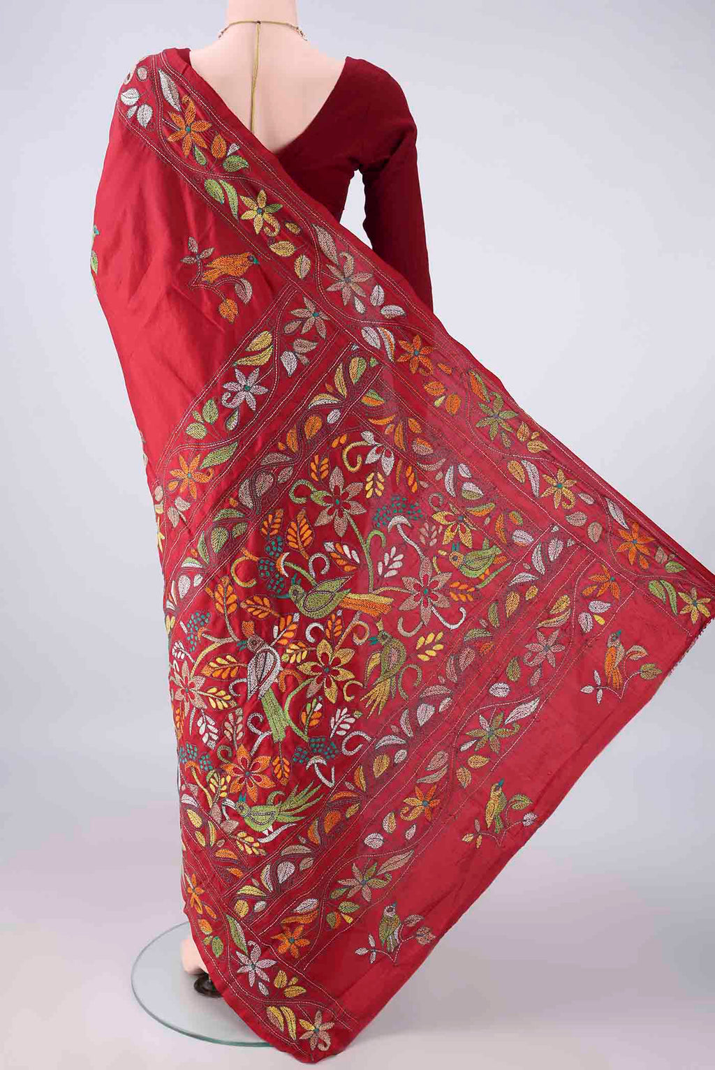 Flat view of Pure Silk Deep Red Kantha Saree with Kantha Work on the body and Thread Border. 