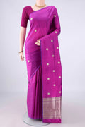 Pure Silk Magenta Banarasi Katan Saree with Zari Butta on the body and Without Border.  displayed on a mannequin