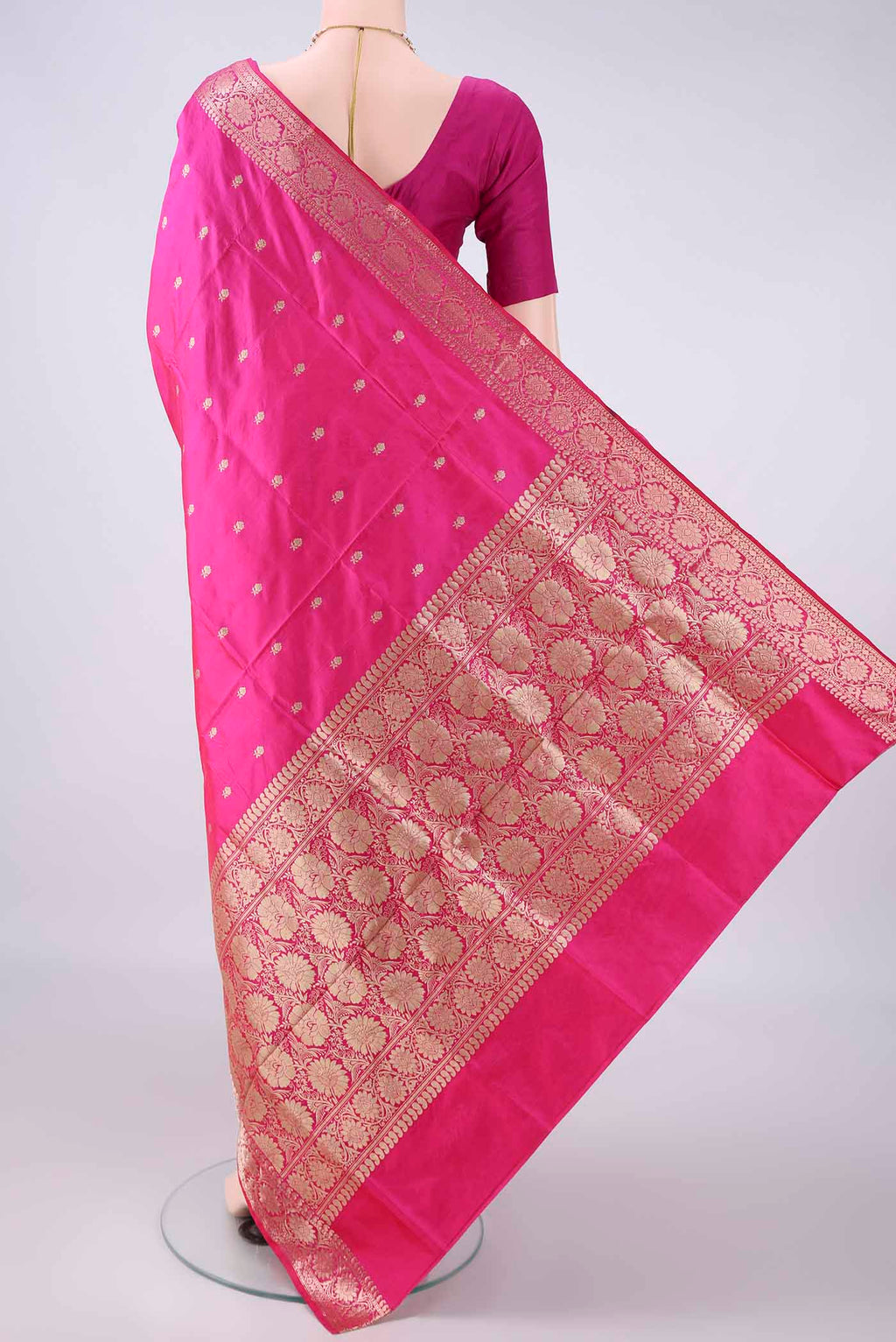Flat view of Pure Silk Pink Banarasi Katan Saree with Zari Butta on the body and Zari Border. 