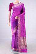 Pure Silk Magenta Banarasi Katan Saree with Zari Butta on the body and Zari Border.  displayed on a mannequin