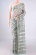 White Chanderi Cotton Saree with Printed design on the body and Thin Zari Line.  displayed on a mannequin