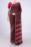 Brown Chanderi Cotton Saree with Batik Print on the body and Thin Zari Line.  displayed on a mannequin