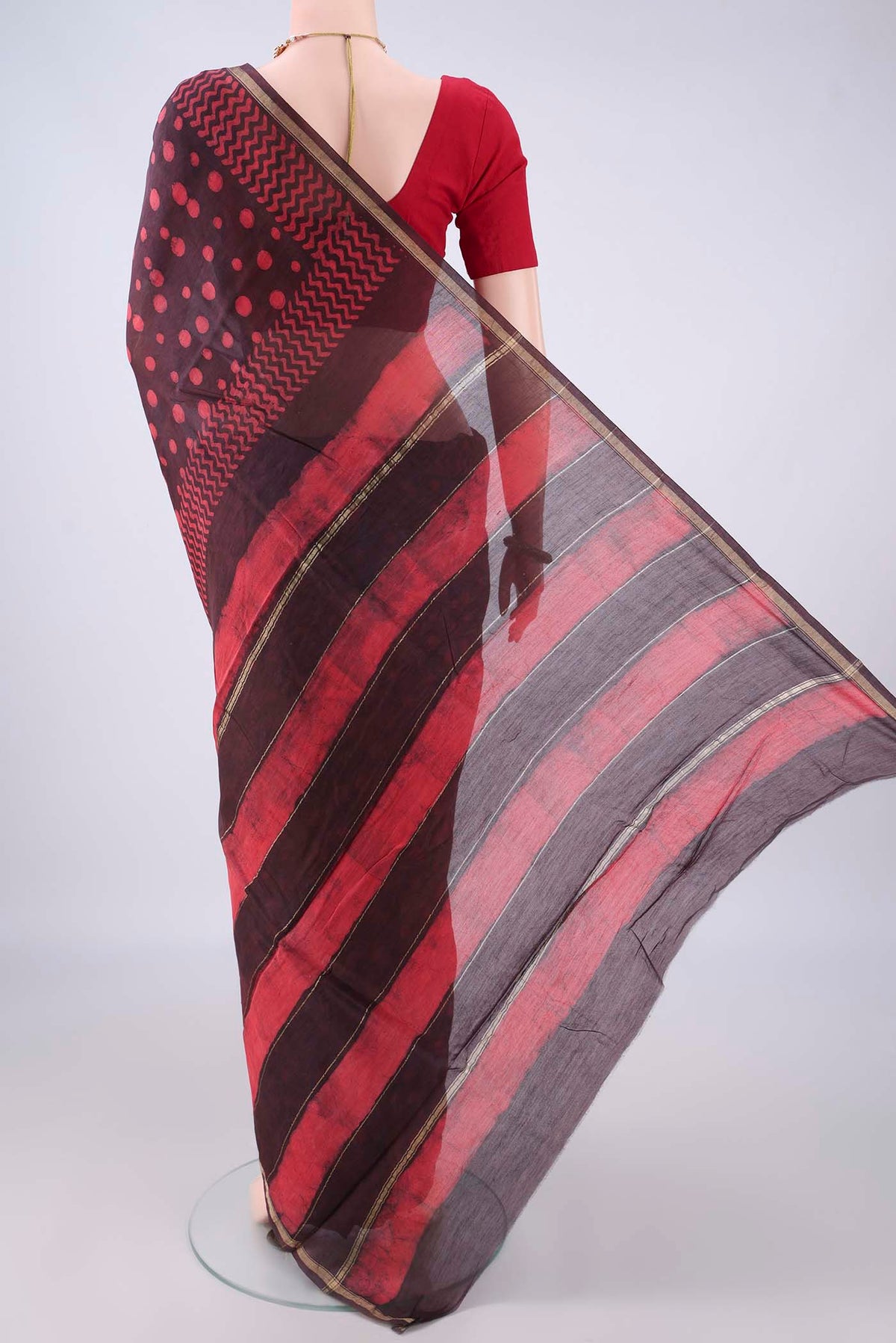 Flat view of Brown Chanderi Cotton Saree with Batik Print on the body and Thin Zari Line. 